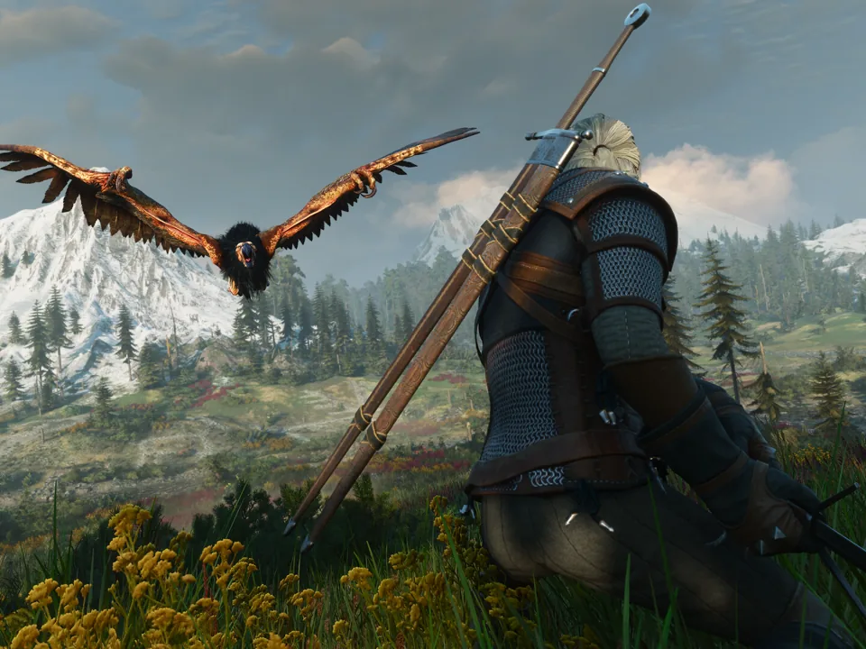 Geralt aiming at a winged griffin in an official Remastered screenshot